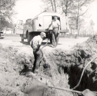 Early Jones employees doing tank installation.